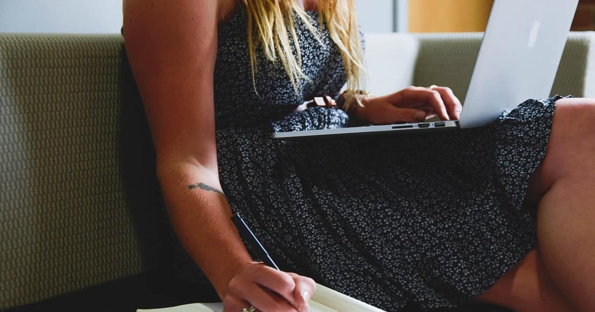 Entrepreneur at a desk reviewing CRM data, representing affordable Salesforce alternatives for small business in 2026